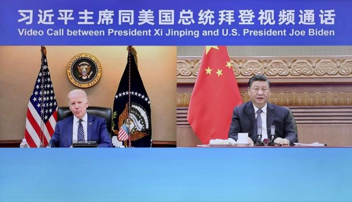 (时政)(1)习近平同美国总统拜登视频通话