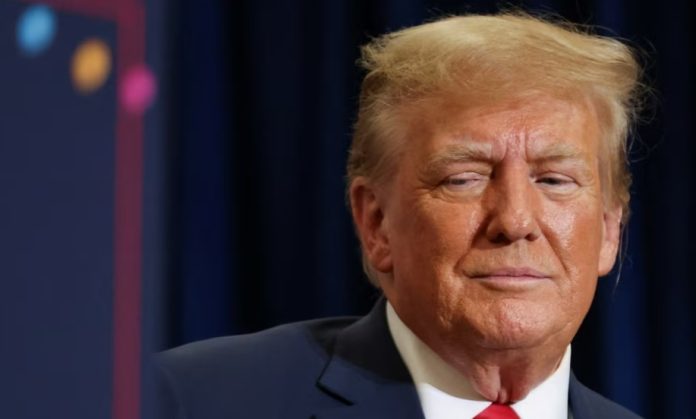 美国前总统唐纳德·特朗普2023年12月19日在爱荷华州参加竞选活动。